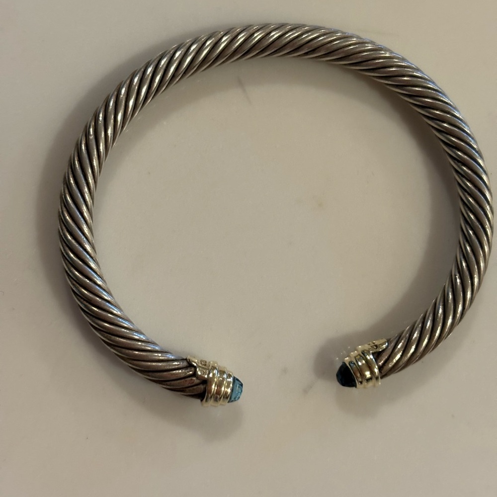 David Yurman Bracelet . Sterling with 14k gold accents. Blue Topaz stones.
